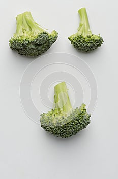 Three broccoli florets