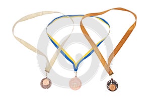 Three bronze medals on white