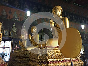 Three bronze statues of Buddha Disciples photo