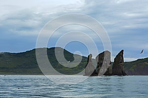 Three Brothers Rocks in the Avacha Bay of Pacific Ocean. Coast of Kamchatka.