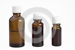 Three browm medical bottles