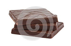 Three brown chocolate pieces