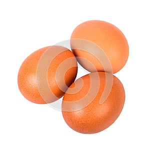 Three brown eggs