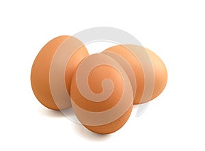 Three brown eggs