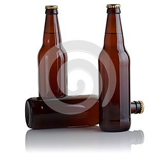 Three brown glass beer bottles