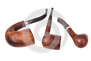 Three brown tobacco pipes