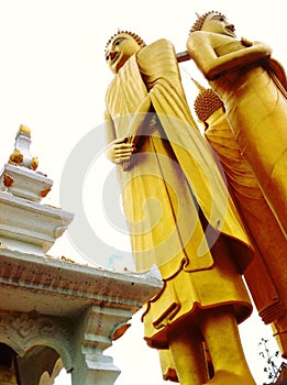 Three Buddha Images Standing Elegantly on The