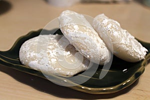 Three buns of Japanese plain mochi on a plate