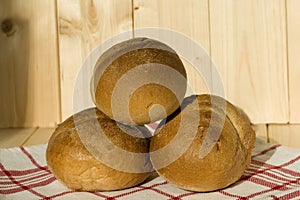 Three buns of wheat flour for a breakfast. Belgian bread. Closeup