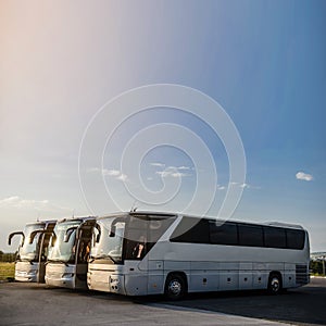 Three buses staying in the parking lot Front Way