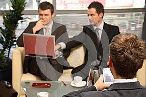 Three Business men working in the office