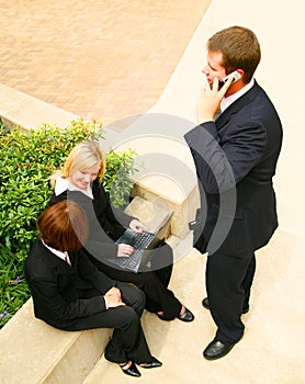 Three Business Poeple Working Outdoor