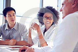 Three business professionals working together