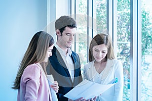 Three Business team discussing on business in team meeting