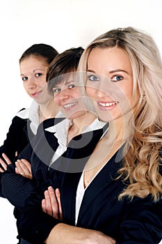 Three business women standing