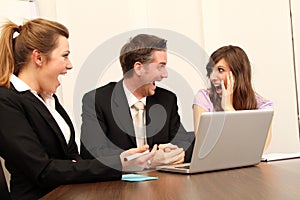 Three business workers sitting