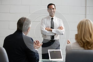Three businesspeople during a meeting photo
