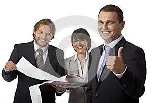 Three businesspeople thumb up