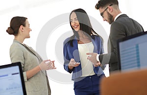 Friendly business team having discussion in office