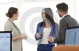 Friendly business team having discussion in office