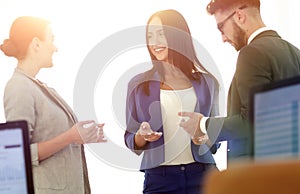 Friendly business team having discussion in office