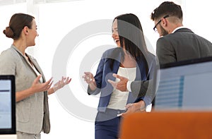 Friendly business team having discussion in office