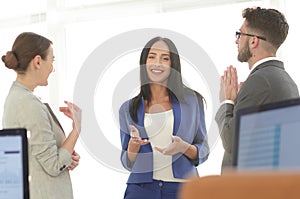 Friendly business team having discussion in office