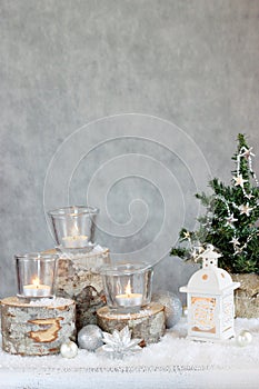 Three candles and Christmas tree