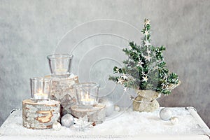 Three candles and Christmas tree