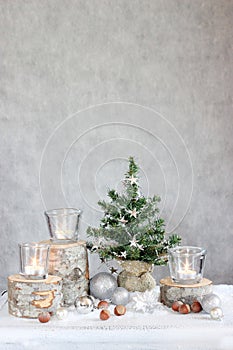 Three candles and Christmas tree