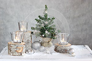 Three candles and Christmas tree