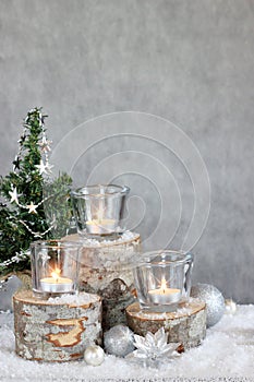 Three candles and Christmas tree