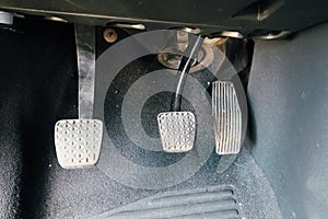 Three Car Pedals. Brake clutch and accelerator pedal of manual transmission car. Manual vehicle pedals