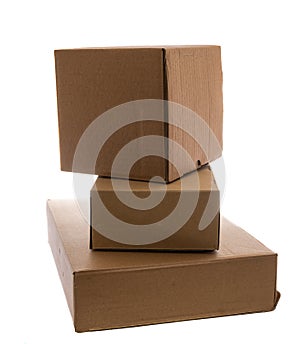 Three cardboard boxes isolated on white.