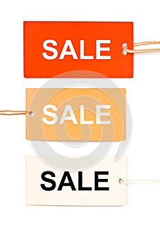 Three cardboard sale tags isolated
