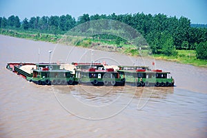 Three cargo ships with sand at Yangtze river