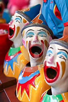 Three carnival laughing clowns