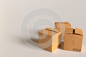 three carton cardboard boxes on grey background