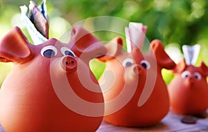Three ceramic piggy