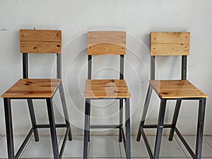 Three chairs placed close together