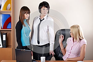 Three charming females at office