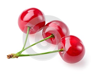 Three cherries isolated on white background