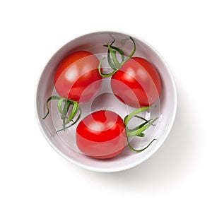 Three Cherry Tomatoes In White Bowl Isolated
