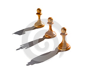 Three chess pawn casting Queen King and Knight shadow