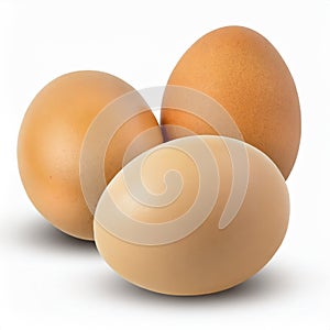 Three chicken eggs isolated on a white background.