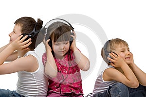 Three Children Listen to Music