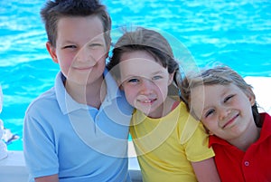 Three children on the water