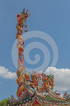 Three Chinese golden dragons in sunny day