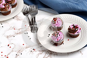 Three chocolate strawberry valentines day cupcakes