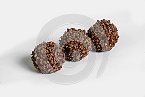 Chocolate truffles on white background